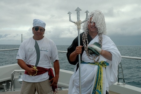 yacht delivery crew dressed up for the crossing of the equator