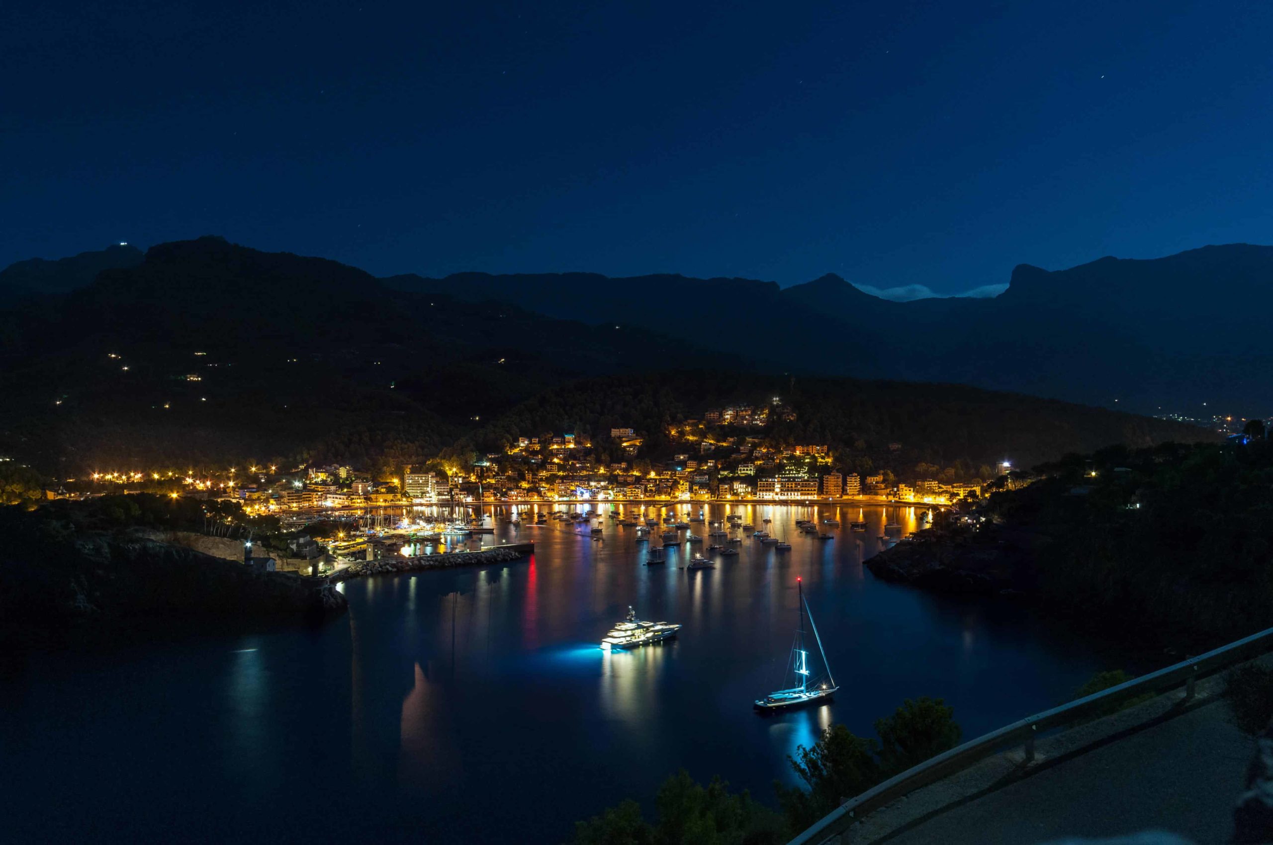 Night photo of lively harbour
