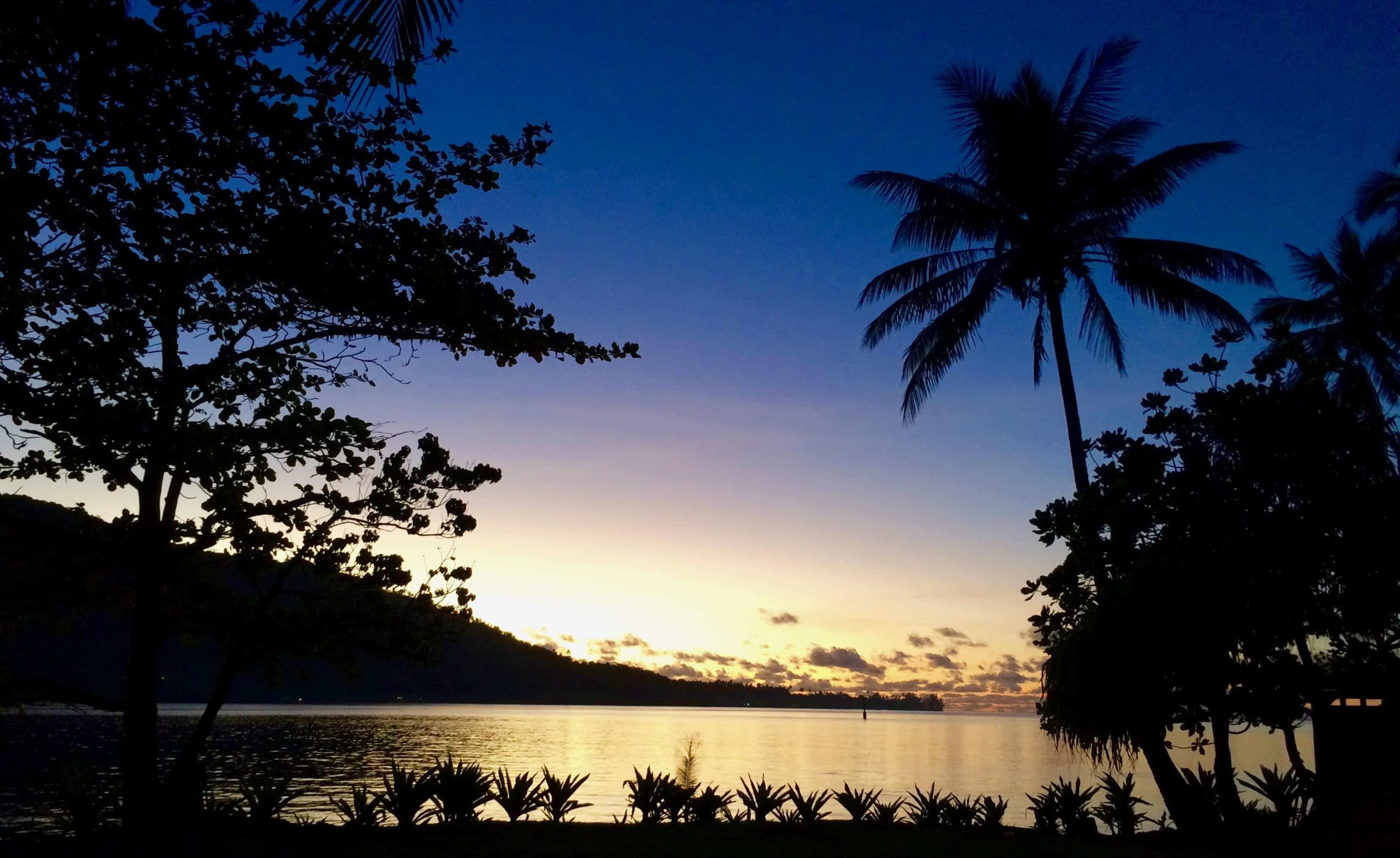 Sunset over the mountains in Moorea, French Polynesia