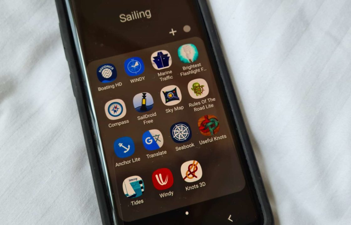 A phone showing the icons of sailing apps