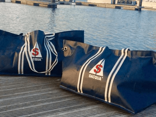 Two saqua sailing bags on the dock