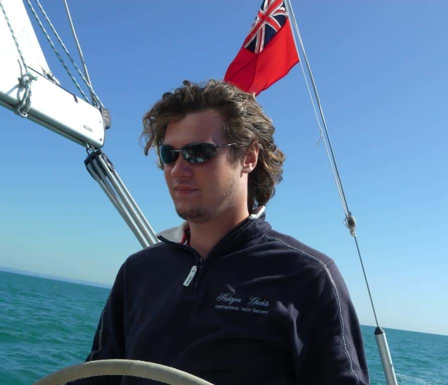 Skipper Louis Abbott sailing on a yacht delivery.