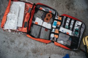 First aid kit for a yacht opened so that you can see the contents.