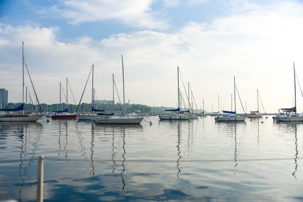How to prepare your yacht for delivery. Mirror calm seas and numerous yachts moored up.
