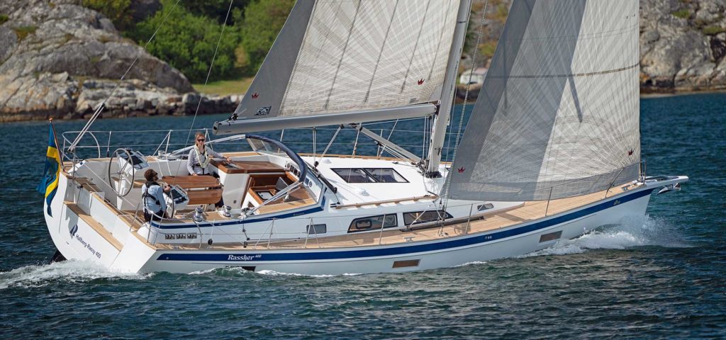 Hallberg Rassy 400 under full sail. three of the best sailing yacht launches for 2021