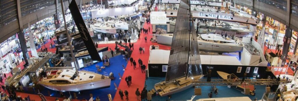 Several yachts and boats viewed from above in the hall at Nautic, the Paris International Boat Show