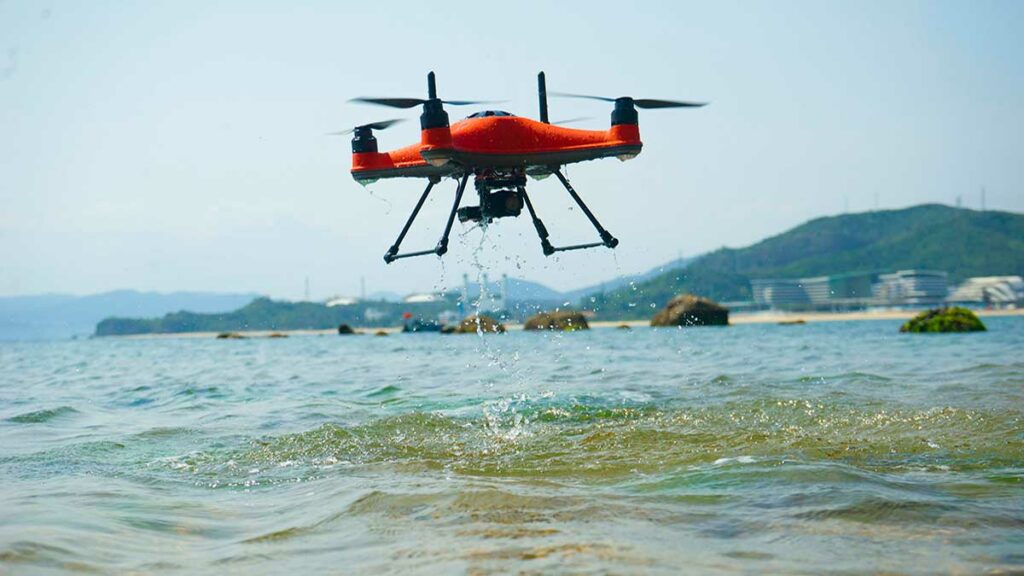 Swellpro waterproof drone taking off from the sea